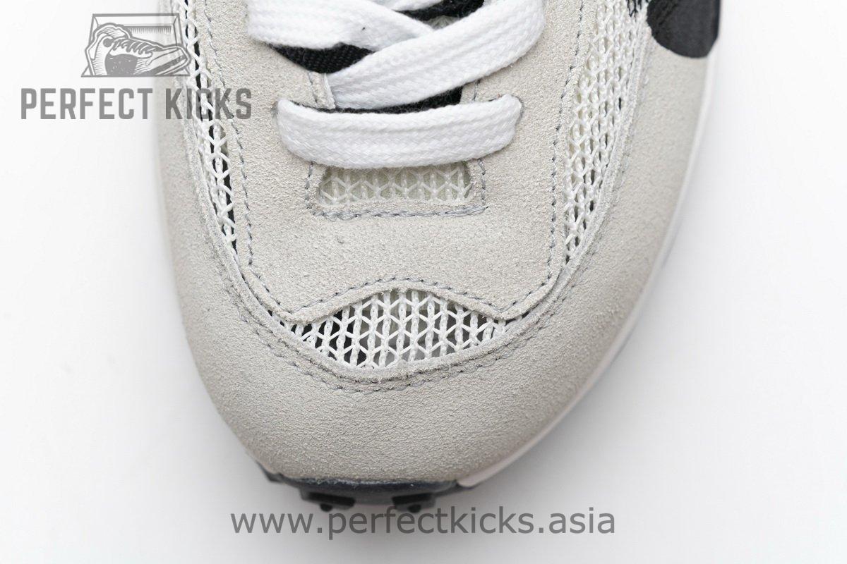 CI9928-010 Sacai x Nike Pegasua Vaporfly Villain Grey Blue Red - Image 11